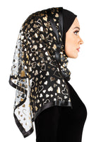 profile of black stylish mona kuwaiti hijab wrap with large gold hearts